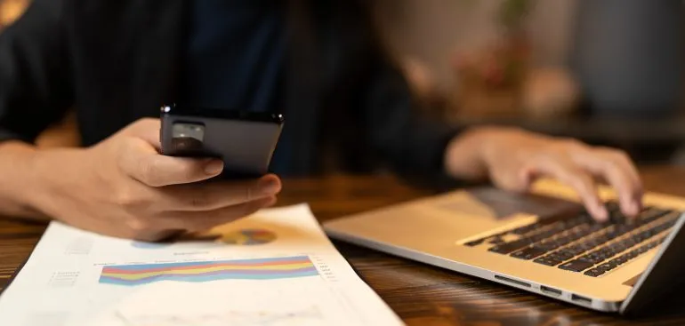 hand-stamping-with-approved-stamp-on-certificate-document-public-paper-at-desk-notary-or-business-770×367