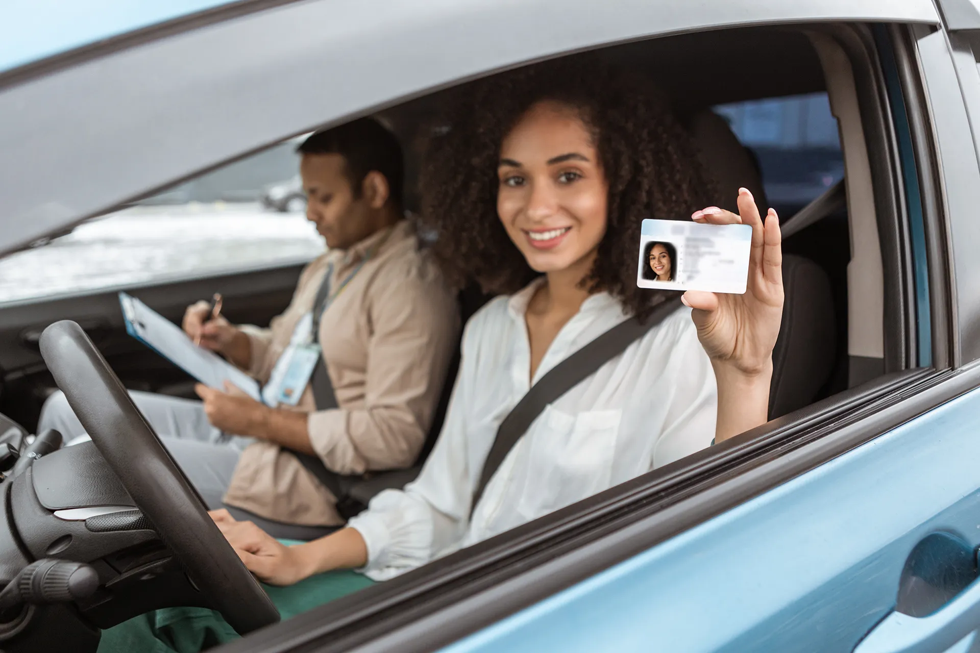 cheerful-arabic-lady-showing-driving-license-card-2023-05-30-11-34-16-utc