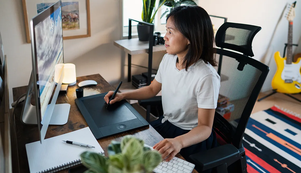 Female designer working from her home office